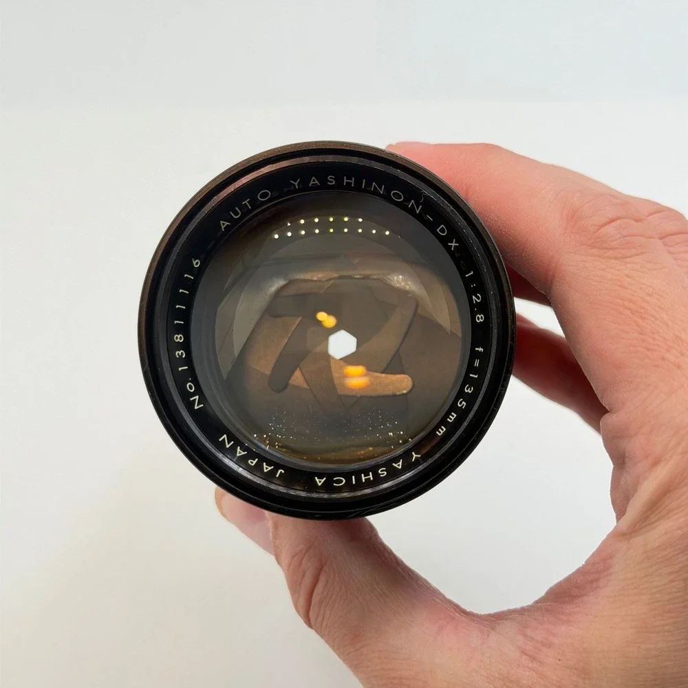 Yashica Auto Yashinon-DX 135mm f2.8 M42 Mount Lens with 55mm Toshiba Filter